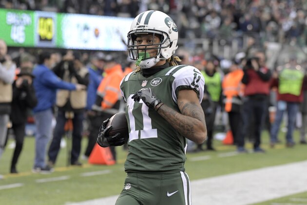 New York Jets wide receiver Robby Anderson (11) runs into the end zone while scoring on a pass from quarterback Josh McCown, not pictured, during the second half of an NFL football game against the Carolina Panthers, Sunday, Nov. 26, 2017, in East Rutherford, N.J. (AP Photo/Bill Kostroun)