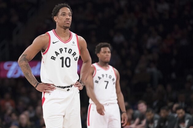Toronto Raptors guard DeMar DeRozan (10) and guard Kyle Lowry (7) wait for a free throw during the first half of an NBA basketball game against the New York Knicks, Sunday, March 11, 2018, at Madison Square Garden in New York. (AP Photo/Mary Altaffer)