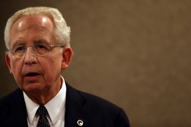 COLLEGE STATION, TX - SEPTEMBER 08:  SEC commissioner Mike Slive talks with the media before a game between the Florida Gators and the Texas A&M Aggies at Kyle Field on September 8, 2012 in College Station, Texas.  (Photo by Ronald Martinez/Getty Images)