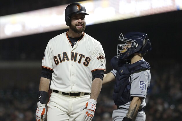 San Francisco Giants' Brandon Belt reacts after striking out against the San Diego Padres during the sixth inning of a baseball game in San Francisco, Tuesday, May 1, 2018. The Padres won 3-2. (AP Photo/Jeff Chiu)