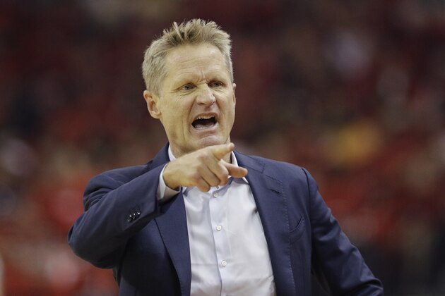 Golden State Warriors head coach Steve Kerr signals during the first half in Game 2 of the NBA basketball Western Conference Finals against the Houston Rockets, Wednesday, May 16, 2018, in Houston. (AP Photo/David J. Phillip)