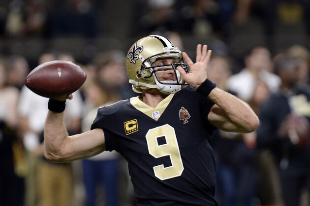 New Orleans Saints quarterback Drew Brees (9) warms up before an NFL football game against the Atlanta Falcons in New Orleans, Sunday, Dec. 24, 2017. (AP Photo/Bill Feig)