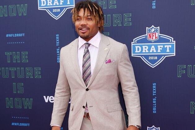 ARLINGTON, TX - APRIL 26:  Derrius Guice of LSU poses on the red carpet prior to the start of the 2018 NFL Draft at AT&T Stadium on April 26, 2018 in Arlington, Texas.  (Photo by Tim Warner/Getty Images)