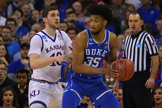 OMAHA, NE - MARCH 25: Marvin Bagley III #35 of the Duke Blue Devils moves the ball against Sviatoslav Mykhailiuk #10 of the Kansas Jayhawks during the 2018 NCAA Men's Basketball Tournament Midwest Regional Final at CenturyLink Center on March 25, 2018 in Omaha, Nebraska. (Photo by Lance King/Getty Images)