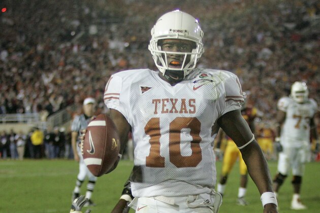 Texas quarterback Vince Young rushes for the game-winning touchdown against Southern California as Texas meets Southern California in the Rose Bowl, the national championship college football game in Pasadena, Calif., Wednesday, Jan. 4, 2006. Texas won the game 41-38.  (AP Photo/Paul Sakuma)