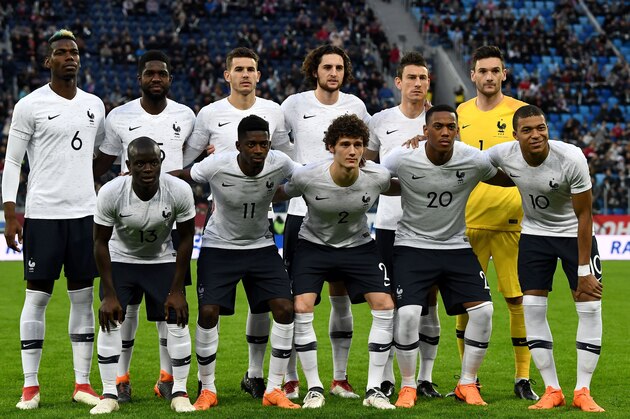 back row from L: France's midfielder Paul Pogba, France's defender Samuel Umtiti, France's defender Lucas Hernandez, France's midfielder Adrien Rabiot, France's defender Laurent Koscielny, France's goalkeeper Hugo Lloris, front row from L: France's midfielder N'golo Kante, France's forward Ousmane Dembele, France's defender Benjamin Pavard, France's forward Anthony Martial and France's forward Kylian Mbappe pose for a team picture prior to an international friendly football match between Russia and France at the Saint Petersburg Stadium in Saint Petersburg on March 27, 2018. / AFP PHOTO / FRANCK FIFE        (Photo credit should read FRANCK FIFE/AFP/Getty Images)