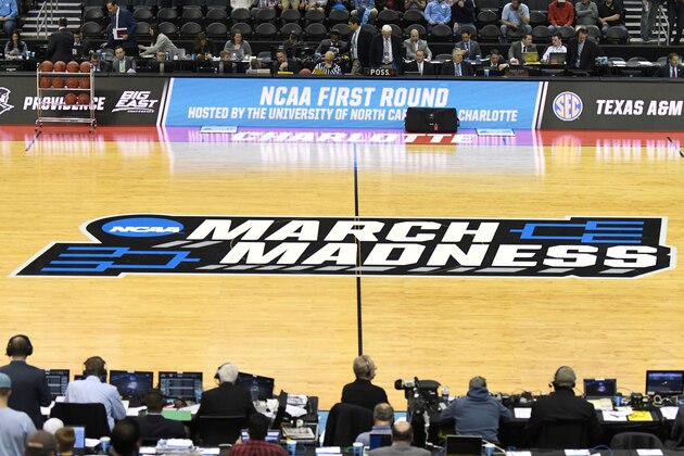 CHARLOTTE, NC - MARCH 16: The NCAA March Madness logo on the floor before the first round of the 2018 NCAA Men's Basketball Tournament between the Texas A&M Aggies and the Providence Friars at the Spectrum Center on March 16, 2018 in Charlotte, North Carolina. The Aggies won 73-69.  (Photo by Mitchell Layton/Getty Images)
