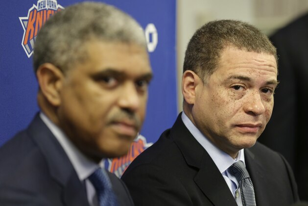 New York Knicks' general manager Scott Perry, right, and president Steve Mills speak to reporters at a news conference in Tarrytown, N.Y., Thursday, April 12, 2018. The Knicks fired coach Jeff Hornacek early Thursday, making the decision shortly after beating Cleveland on Wednesday night to finish a 29-53 season. They lost more than 50 games and missed the playoffs both seasons under Hornacek. (AP Photo/Seth Wenig)
