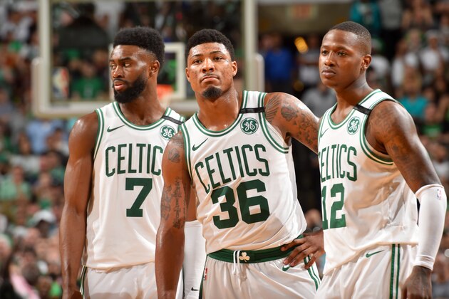 BOSTON, MA - MAY 15: Jaylen Brown #7, Marcus Smart #36, and Terry Rozier #12 of the Boston Celtics looks on during the game against the Cleveland Cavaliers during Game Two of the Eastern Conference Finals of the 2018 NBA Playoffs on May 15, 2018 at the TD Garden in Boston, Massachusetts. NOTE TO USER: User expressly acknowledges and agrees that, by downloading and or using this photograph, User is consenting to the terms and conditions of the Getty Images License Agreement. Mandatory Copyright Notice: Copyright 2018 NBAE (Photo by Jesse D. Garrabrant/NBAE via Getty Images) BOSTON, MA - MAY 15: Jaylen Brown #7, Marcus Smart #36, and Terry Rozier #12 of the Boston Celtics looks on during the game against the Cleveland Cavaliers during Game Two of the Eastern Conference Finals of the 2018 NBA Playoffs on May 15, 2018 at the TD Garden in Boston, Massachusetts. NOTE TO USER: User expressly acknowledges and agrees that, by downloading and or using this photograph, User is consenting to the terms and conditions of the Getty Images License Agreement. Mandatory Copyright Notice: Copyright 2018 NBAE (Photo by Jesse D. Garrabrant/NBAE via Getty Images)