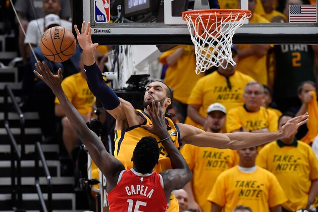 SALT LAKE CITY, UT - MAY 06 Rudy Gobert #27 of the Utah Jazz blocks the shot of Clint Capela #15 of the Houston Rockets in the first half during Game Four of Round Two of the 2018 NBA Playoffs at Vivint Smart Home Arena on May 6, 2018 in Salt Lake City, Utah. NOTE TO USER: User expressly acknowledges and agrees that, by downloading and or using this photograph, User is consenting to the terms and conditions of the Getty Images License Agreement. (Photo by Gene Sweeney Jr./Getty Images)
