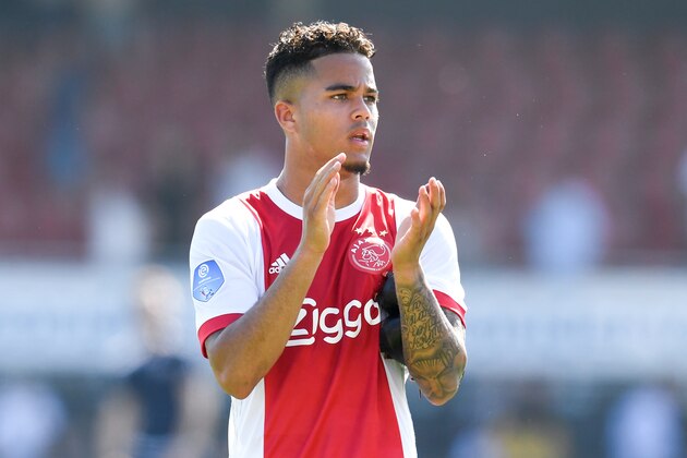 ROTTERDAM, NETHERLANDS - MAY 6: (L-R) Justin Kluivert of Ajax celebrate the victory during the Dutch Eredivisie  match between Excelsior v Ajax at the Van Donge & De Roo Stadium on May 6, 2018 in Rotterdam Netherlands (Photo by Angelo Blankespoor/Soccrates/Getty Images)