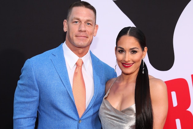 WESTWOOD, CA - APRIL 03:  John Cena (L) and Nikki Bella attend the premiere of Universal Pictures' 'Blockers' at Regency Village Theatre on April 3, 2018 in Westwood, California.  (Photo by Christopher Polk/Getty Images)