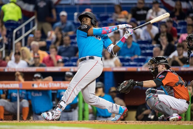 MIAMI, FL - JULY 9: Vladimir Guerrero Jr. #27 of the Toronto Blue Jays and the World Team bats during the SiriusXM All-Star Futures Game at Marlins Park on July 9, 2017 in Miami, Florida. (Photo by Brace Hemmelgarn/Minnesota Twins/Getty Images)