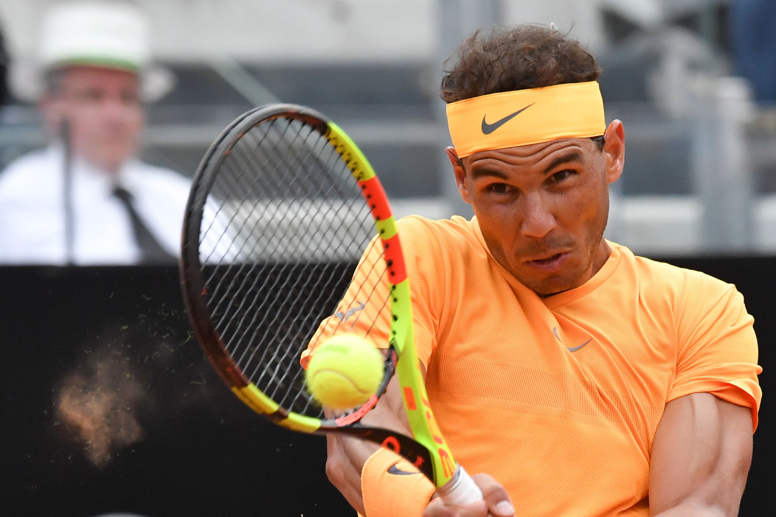 Spain's Rafael Nadal returns the ball to Italy's Fabio Fognini during Rome's ATP Tennis Open tournament at the Foro Italico, on May 18, 2018 in Rome. (Photo by Andreas SOLARO / AFP)        (Photo credit should read ANDREAS SOLARO/AFP/Getty Images)