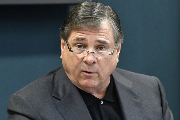 University of Louisville Athletic Director Tom Jurich responds to a question during a press conference, Thursday, Oct. 20, 2016, in Louisville, Ky. The NCAA accused Louisville of four violations stemming from its investigation into allegations that a former basketball staffer hired escorts and strippers for sex parties with recruits and players. (AP Photo/Timothy D. Easley)