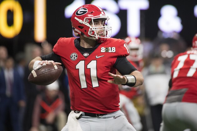 ATLANTA, GA - JANUARY 08: Jake Fromm #11 of the Georgia Bulldogs passes against the Alabama Crimson Tide during the College Football Playoff National Championship held at Mercedes-Benz Stadium on January 8, 2018 in Atlanta, Georgia. Alabama defeated Georgia 26-23 for the national title. (Photo by Jamie Schwaberow/Getty Images)