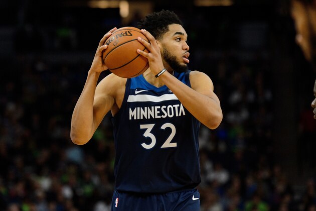 MINNEAPOLIS, MN - APRIL 23: Karl-Anthony Towns #32 of the Minnesota Timberwolves has the ball against the Houston Rockets in Game Four of Round One of the 2018 NBA Playoffs on April 23, 2018 at the Target Center in Minneapolis, Minnesota. The Rockets defeated the Timberwolves 119-100. NOTE TO USER: User expressly acknowledges and agrees that, by downloading and or using this Photograph, user is consenting to the terms and conditions of the Getty Images License Agreement. (Photo by Hannah Foslien/Getty Images)