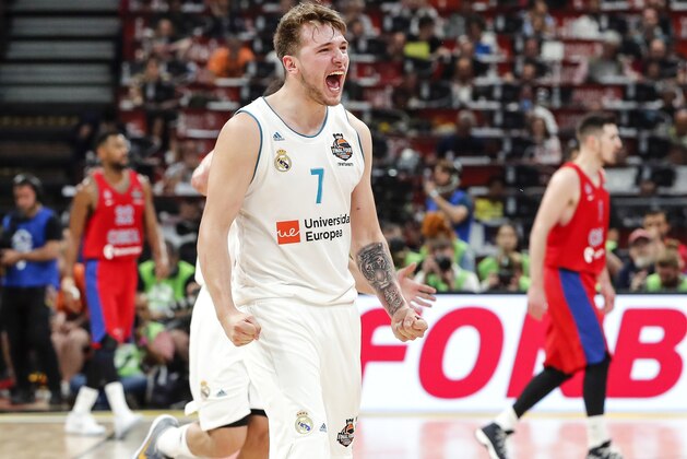 BELGRADE, SERBIA - MAY 18: Luka Doncic (C) of Real Madrid celebrates during the Turkish Airlines Euroleague Final Four Belgrade 2018 Semifinal match between CSKA Moscow and Real Madrid at Stark Arena on May 18, 2018 in Belgrade, Serbia. (Photo by Srdjan Stevanovic/Getty Images)