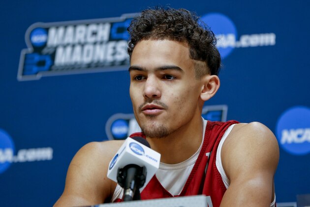 FILE - In this March 13, 2018, file photo, Oklahoma's Trae Young answers questions during a news conference for an NCAA college basketball first round game in Pittsburgh. Oklahoma star freshman Trae Young is leaving for the NBA after a standout season. The 6-foot-2 guard averaged 27.4 points and 8.7 assists this season, and many projections have him going early in the first round. He posted the reasons for his decision on ESPN early Tuesday, March 20, 2018, saying he was ready to put in the work needed to play in the NBA. (AP Photo/Keith Srakocic, File)