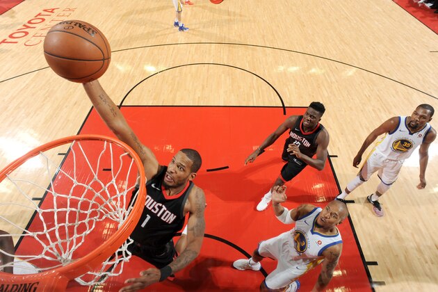 HOUSTON, TX - MAY 16: Trevor Ariza #1 of the Houston Rockets goes up for a dunk against the Golden State Warriors during Game Two of the Western Conference Finals of the 2018 NBA Playoffs on May 16, 2018 at the Toyota Center in Houston, Texas. NOTE TO USER: User expressly acknowledges and agrees that, by downloading and or using this photograph, User is consenting to the terms and conditions of the Getty Images License Agreement. Mandatory Copyright Notice: Copyright 2018 NBAE (Photo by Andrew D. Bernstein/NBAE via Getty Images)