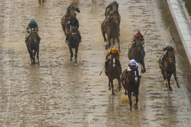 Mike Smith rides Justify to victory during the 144th running of the Kentucky Derby horse race at Churchill Downs Saturday, May 5, 2018, in Louisville, Ky. (AP Photo/Charlie Riedel)