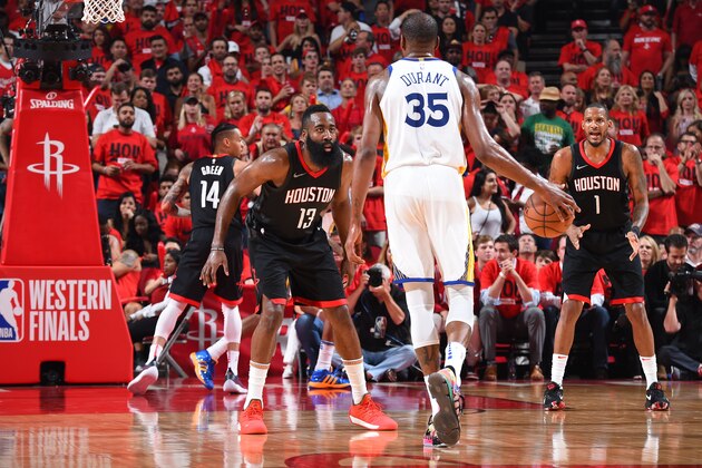 HOUSTON, TX - MAY 16:  James Harden #13 of the Houston Rockets plays defense against Kevin Durant #35 of the Golden State Warriors during Game Two of the Western Conference Finals of the 2018 NBA Playoffs on May 16, 2018 at the Toyota Center in Houston, Texas. NOTE TO USER: User expressly acknowledges and agrees that, by downloading and or using this photograph, User is consenting to the terms and conditions of the Getty Images License Agreement. Mandatory Copyright Notice: Copyright 2018 NBAE (Photo by Andrew D. Bernstein/NBAE via Getty Images)
