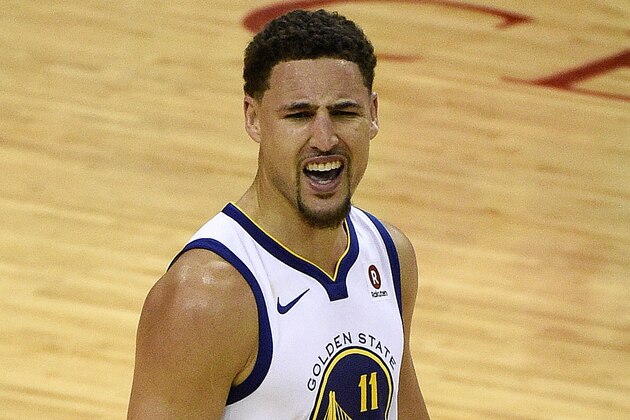 Golden State Warriors guard Klay Thompson reacts after a 3-pointer in the second half of Game 1 of the NBA Western Conference basketball Finals against the Houston Rockets, Monday, May 14, 2018, in Houston. (AP Photo/Eric Christian Smith)