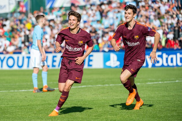 NYON, SWITZERLAND - APRIL 20: #14 Picard Puig of FC Barcelona celebrates his goal with teammates during the semi-final football match between Manchester City and FC Barcelona of UEFA Youth League at Colovray Sports Centre on April 20, 2018 in Nyon, Switzerland. (Photo by Monika Majer/Getty Images)