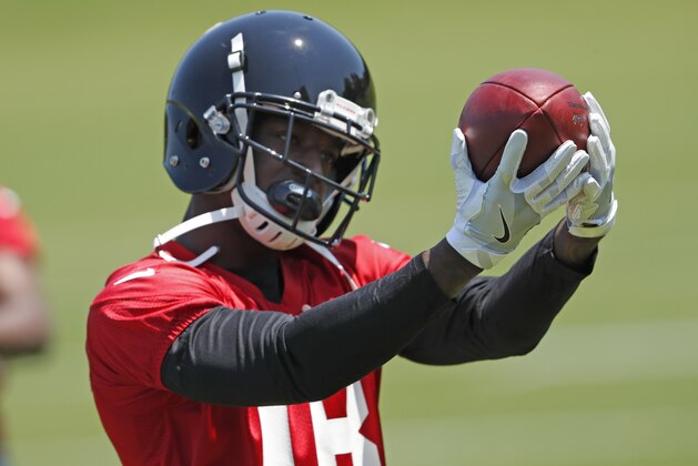 Atlanta Falcons rookie receiver Calvin Ridley warms up before start of the first NFL football practice at rookie camp Friday, May 11, 2018, in Flowery Branch, Ga. (AP Photo/John Bazemore)