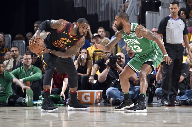 CLEVELAND, OH - MAY 19: LeBron James #23 of the Cleveland Cavaliers handles the ball against the Boston Celtics in Game Three of the Eastern Conference Finals during the 2018 NBA Playoffs on May 19, 2018 at Quicken Loans Arena in Cleveland, Ohio. NOTE TO USER: User expressly acknowledges and agrees that, by downloading and/or using this photograph, user is consenting to the terms and conditions of the Getty Images License Agreement. Mandatory Copyright Notice: Copyright 2018 NBAE (Photo by David Liam Kyle/NBAE via Getty Images)