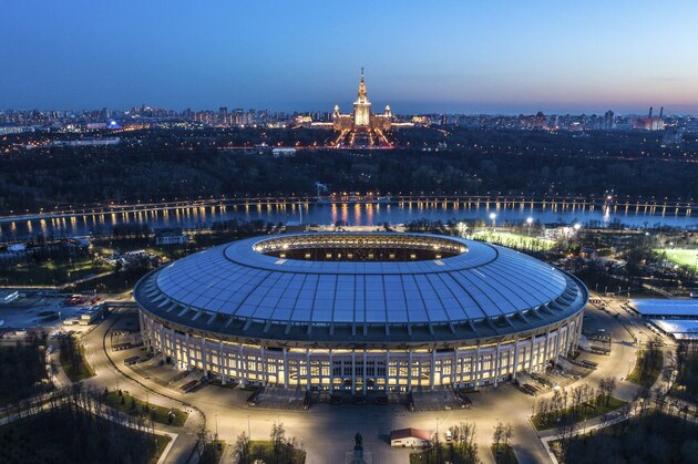 This photo taken on Monday, April 23, 2018, shows an aerial view of the World Cup Luzhniki stadium with the Moscow River and the State University in the background in Moscow, Russia. The Luzhniki stadium will hold the 2018 World Cup final. (AP Photo/Dmitry Serebryakov)