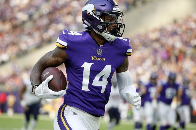 Minnesota Vikings wide receiver Stefon Diggs runs up field after making a reception during the first half of an NFL football game against the Chicago Bears, Sunday, Dec. 31, 2017, in Minneapolis. (AP Photo/Bruce Kluckhohn)