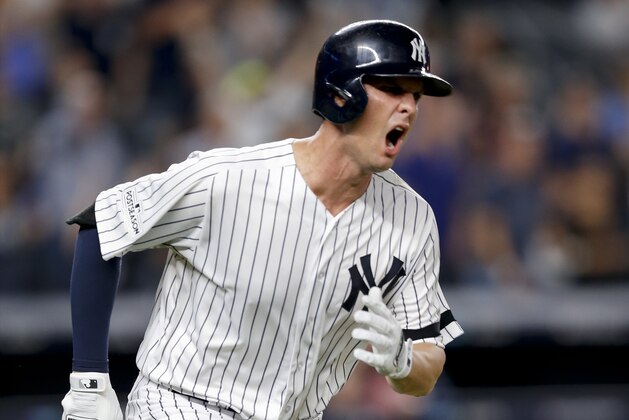 New York Yankees' Greg Bird reacts after hitting a solo home run against the Cleveland Indians during the seventh inning in Game 3 of baseball's American League Division Series, Sunday, Oct. 8, 2017, in New York. (AP Photo/Kathy Willens)