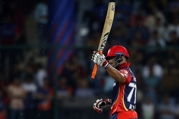 Delhi Daredevils' Rishabh Pant raises his bat scoring fifty runs during VIVO IPL cricket T20 match against Rajasthan Royals in New Delhi, India, Wednesday, May 2, 2018. (AP Photo/Altaf Qadri)