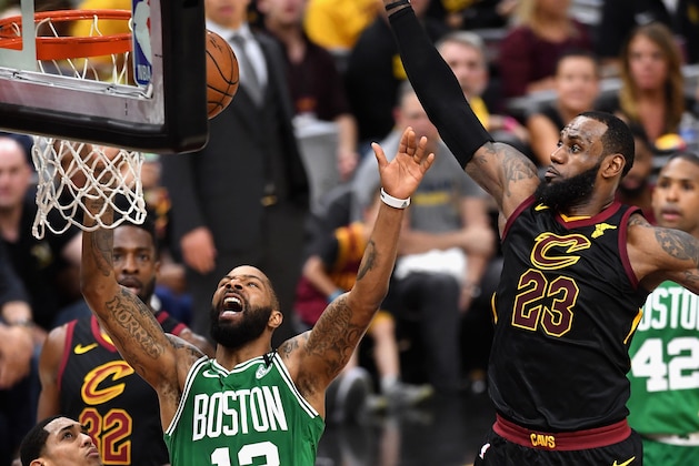 CLEVELAND, OH - MAY 19:  Marcus Morris #13 of the Boston Celtics battles for the ball with LeBron James #23 of the Cleveland Cavaliers in the first half during Game Three of the 2018 NBA Eastern Conference Finals at Quicken Loans Arena on May 19, 2018 in Cleveland, Ohio. NOTE TO USER: User expressly acknowledges and agrees that, by downloading and or using this photograph, User is consenting to the terms and conditions of the Getty Images License Agreement.  (Photo by Jason Miller/Getty Images)