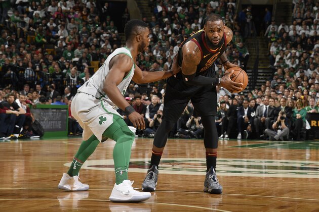 BOSTON, MA - FEBRUARY 11: Semi Ojeleye #37 of the Boston Celtics defends against LeBron James #23 of the Cleveland Cavaliers handling the ball during the game between the two teams on February 11, 2018 at the TD Garden in Boston, Massachusetts.  NOTE TO USER: User expressly acknowledges and agrees that, by downloading and or using this photograph, User is consenting to the terms and conditions of the Getty Images License Agreement. Mandatory Copyright Notice: Copyright 2018 NBAE  (Photo by Brian Babineau/NBAE via Getty Images)