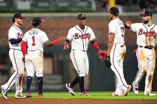 ATLANTA, GA. - MAY 19: Dansby Swanson #7, Ozzie Albies #1, Ronald Acuna, Jr. #13, Johan Camargo #17, and Ender Inciarte #11 of the Atlanta Braves celebra after the game against the Miami Marlins at SunTrust Field on May 19, 2018 in Atlanta, Georgia. (Photo by Scott Cunningham/Getty Images)