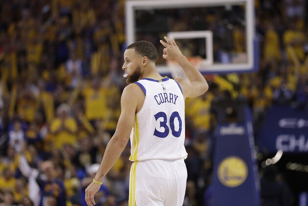 Golden State Warriors guard Stephen Curry (30) gestures during the second half of Game 3 of the NBA basketball Western Conference Finals against the Houston Rockets in Oakland, Calif., Sunday, May 20, 2018. (AP Photo/Marcio Jose Sanchez)
