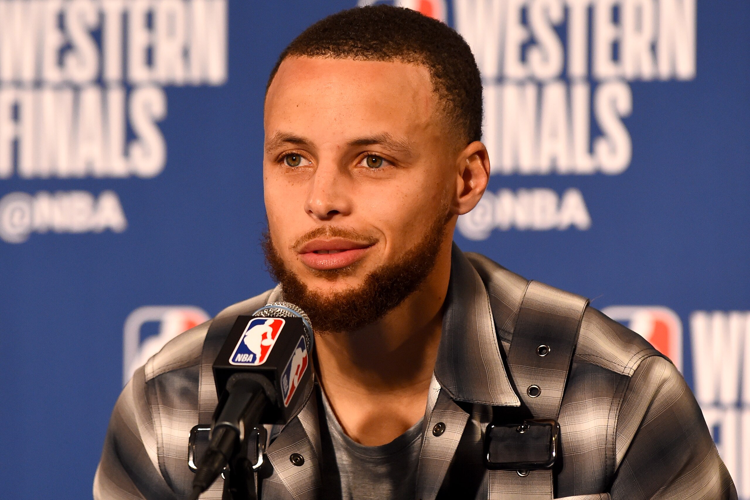 OAKLAND, CA - MAY 20:  Stephen Curry #30 of the Golden State Warriors talks to the media after the game against the Houston Rockets in Game Three of the Western Conference Finals of the 2018 NBA Playoffs on May 20, 2018 at ORACLE Arena in Oakland, California. NOTE TO USER: User expressly acknowledges and agrees that, by downloading and or using this photograph, user is consenting to the terms and conditions of Getty Images License Agreement. Mandatory Copyright Notice: Copyright 2018 NBAE (Photo by Noah Graham/NBAE via Getty Images)