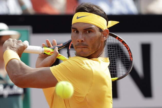 Spain's Rafael Nadal returns the ball to Germany's Alexander Zverev during their final match at the Italian Open tennis tournament in Rome, Sunday, May 20, 2018. (AP Photo/Gregorio Borgia)