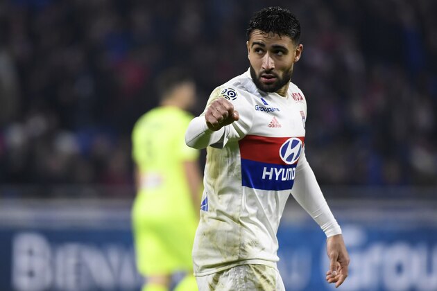 Lyon's French forward Nabil Fekir (R) celebrates after scoring a goal during the French L1 football match between Lyon (OL) and Angers (ASCO) on January 14, 2018, in Decines-Charpieu near Lyon, central-eastern France.  / AFP PHOTO / ROMAIN LAFABREGUE        (Photo credit should read ROMAIN LAFABREGUE/AFP/Getty Images)