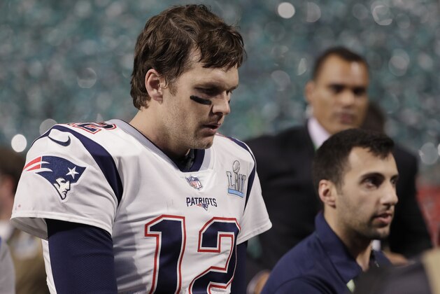New England Patriots' Tom Brady walks off the field after the NFL Super Bowl 52 football game against the Philadelphia Eagles Sunday, Feb. 4, 2018, in Minneapolis. The Eagles won 41-33. (AP Photo/Chris O'Meara)