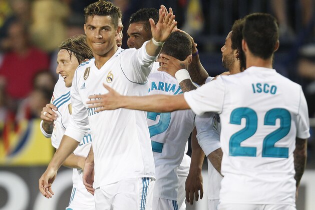 Real Madrid's Cristiano Ronaldo celebrates after scoring against Villarreal during a Spanish La Liga soccer match at the Ceramica stadium in Villarreal, Spain, Saturday, May 19, 2018. (AP Photo/Alberto Saiz)
