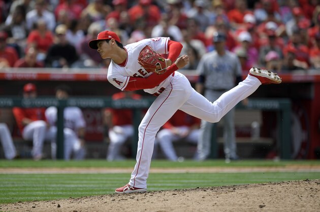 Los Angeles Angels starting pitcher Shohei Ohtani, of Japan, throws to the plate during the seventh inning of a baseball game against the Tampa Bay Rays Sunday, May 20, 2018, in Anaheim, Calif. (AP Photo/Mark J. Terrill)