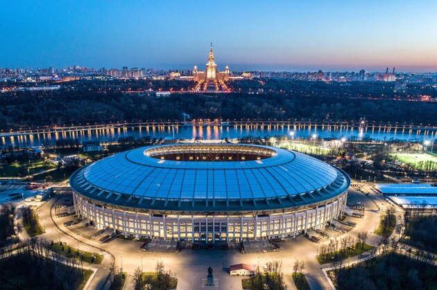 TOPSHOT - An aerial view taken with a drone late on April 23, 2018 shows the Luzhniki stadium and the main building of the Moscow State University in Moscow. (Photo by Dmitry SEREBRYAKOV / AFP)        (Photo credit should read DMITRY SEREBRYAKOV/AFP/Getty Images)