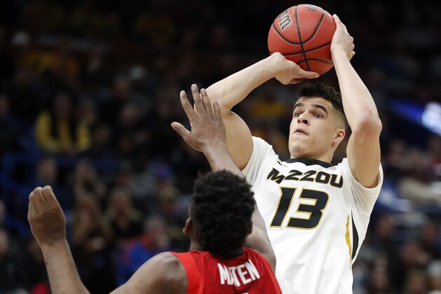 Missouri's Michael Porter Jr. (13) shoots over Georgia's Yante Maten during the first half in an NCAA college basketball game at the Southeastern Conference tournament Thursday, March 8, 2018, in St. Louis. (AP Photo/Jeff Roberson)