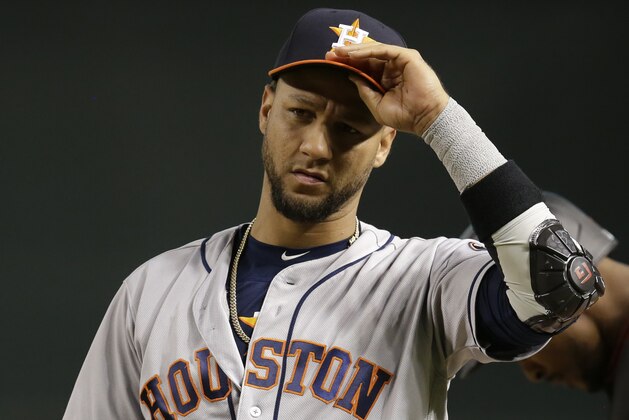 Houston Astros first baseman Yuli Gurriel (10) in the first inning during a baseball game against the Arizona Diamondbacks, Saturday, May 5, 2018, in Phoenix. (AP Photo/Rick Scuteri)
