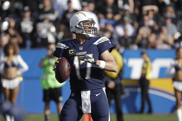 Los Angeles Chargers quarterback Philip Rivers throws a pass during the first half of an NFL football game against the Oakland Raiders, Sunday, Dec. 31, 2017, in Carson, Calif. (AP Photo/Alex Gallardo)