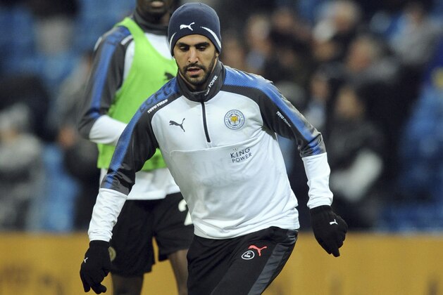 Leicester's Riyad Mahrez controls the ball during warm up before the English Premier League soccer match between Manchester City and Leicester City at the Etihad Stadium in Manchester, England, Saturday, Feb. 10, 2018. (AP Photo/Rui Vieira)