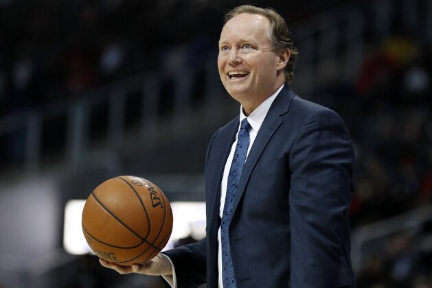Atlanta Hawks head coach Mike Budenholzer reacts to a call in the third quarter of an NBA basketball game against the Toronto Raptors in Atlanta, Wednesday, Jan. 24, 2018. (AP Photo/David Goldman)